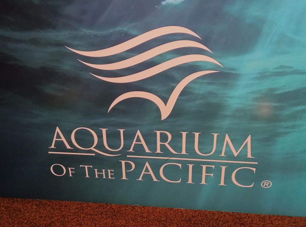 A photo of the Aquarium of the Pacific logo